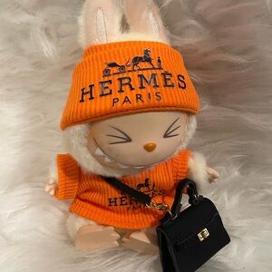 Doll not included. Orange outfit  with Black Bag. Brand new